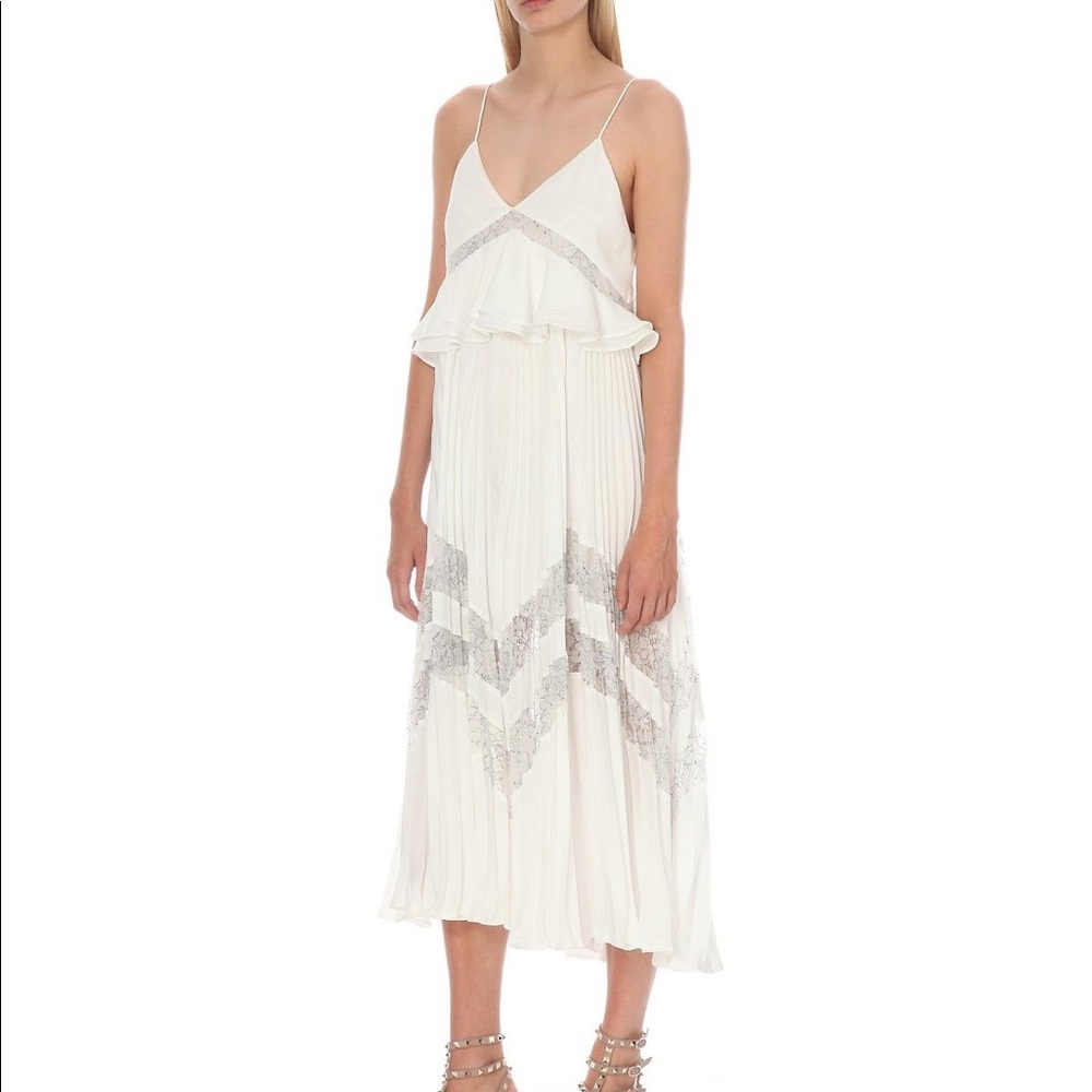 White dress lace, no signs of wear, Like new with no tags, only worn twice.